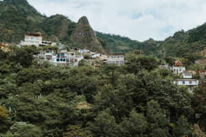 View of Santa Cruz La Laguna perched on hillside, taken from below