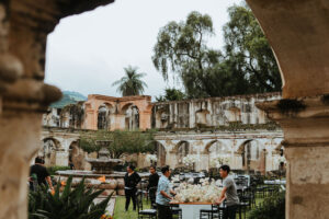 Floral arrangements being set up for a wedding at Santa Clara ruins in Antigua, Guatemala